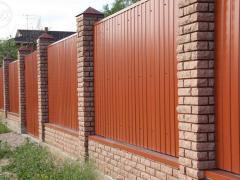 Fence with brick pillars