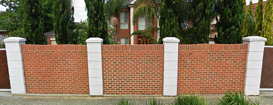Brick fence in a row