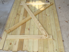 The door to the barn from pine boards