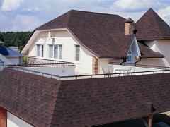 Private house with a roof covered with shingles