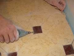 Sanding small defects on marble tile