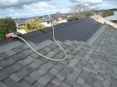 The roof is covered with shingles