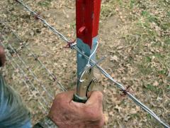 Fastening wire to the posts